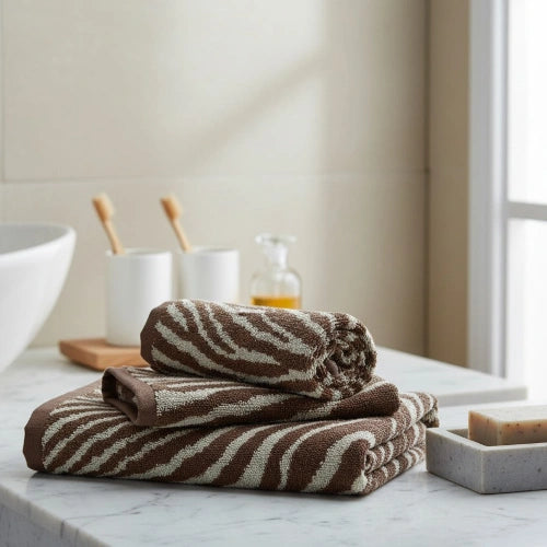 Brown Safari Luxe Cotton Bath Towel folded neatly – soft & absorbent