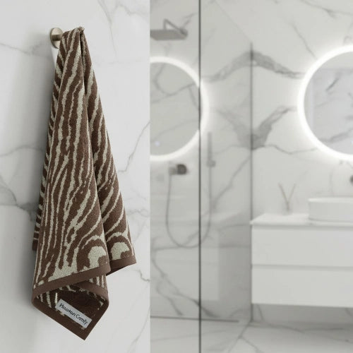 Brown Safari Luxe Bath Towel hanging in bathroom – quick-drying cotton towel