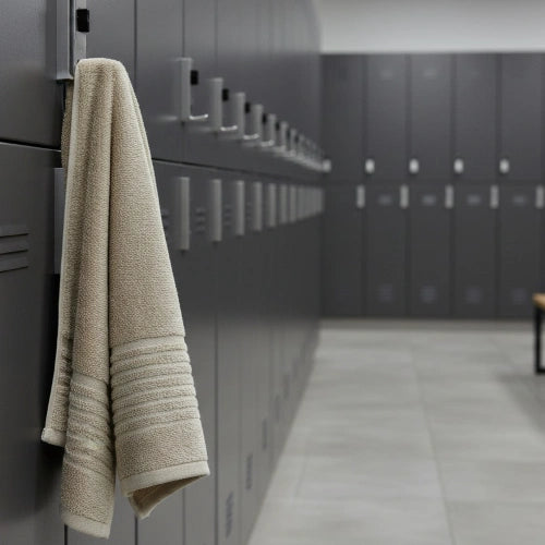 Athlete using Houston Comfy BeigeFit towel after gym workout